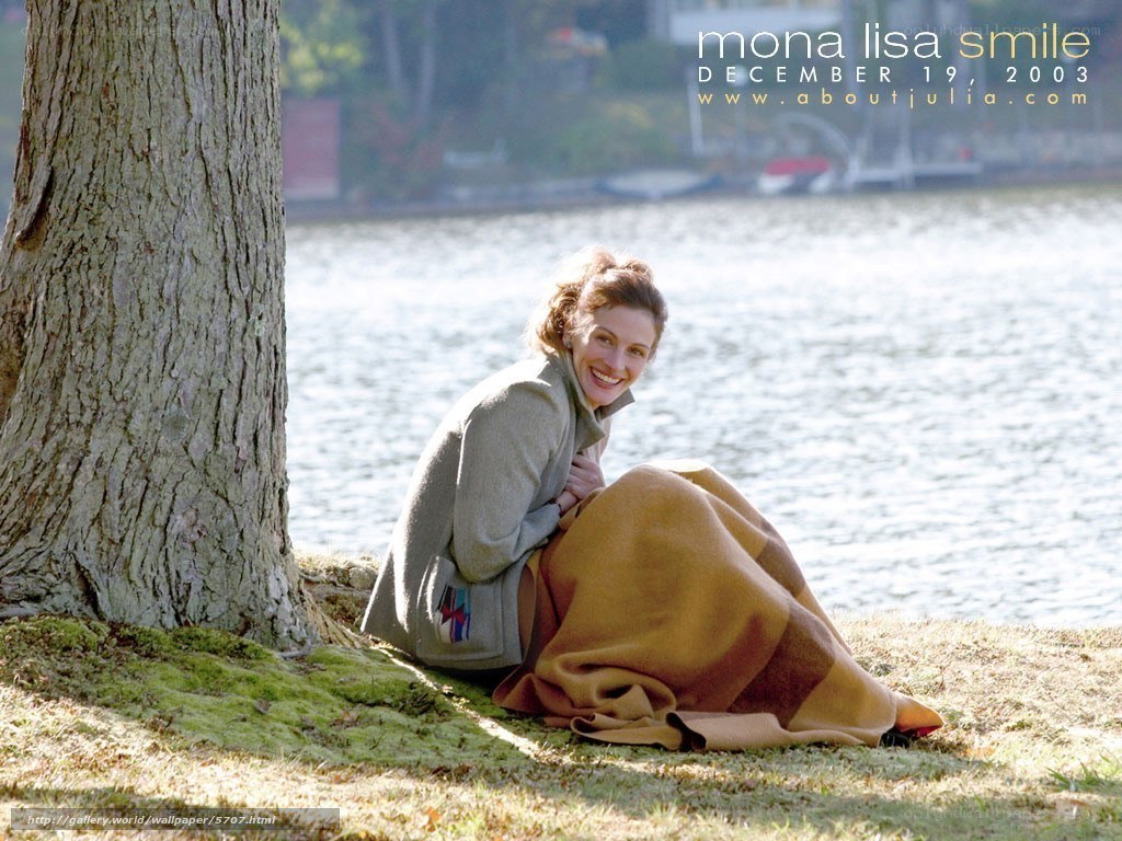 Woman smiling by the lake