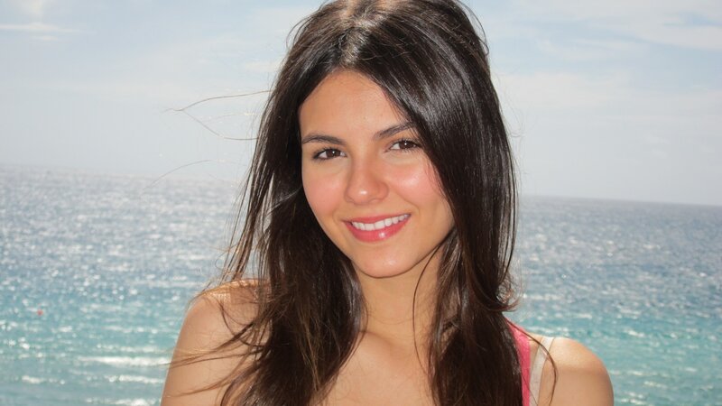 woman smiling by the sea
