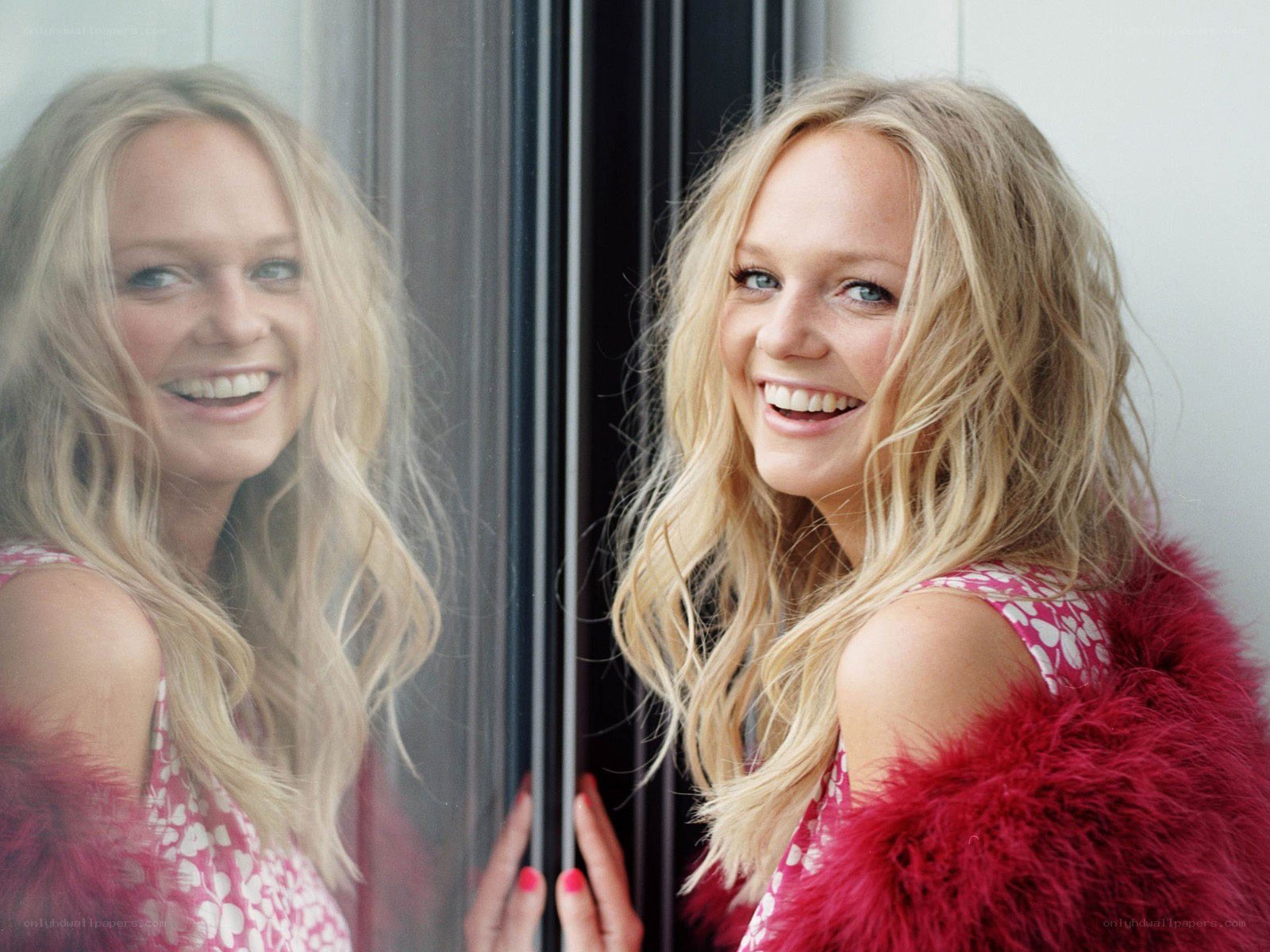 woman smiling by window