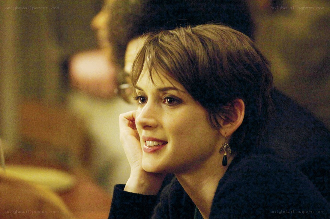 woman smiling in a crowd