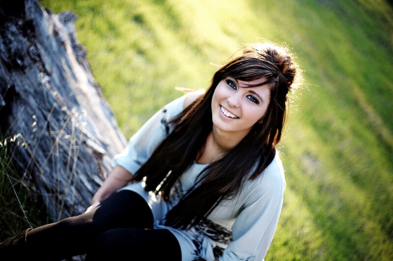 woman smiling in a field