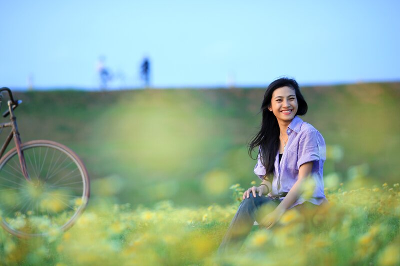 Woman smiling in a field