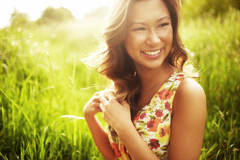 Woman smiling in a field
