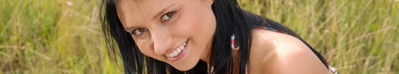 woman smiling in a field