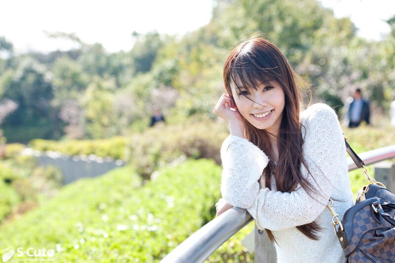 Woman smiling in a park