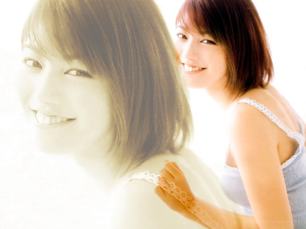 woman smiling in a soft light