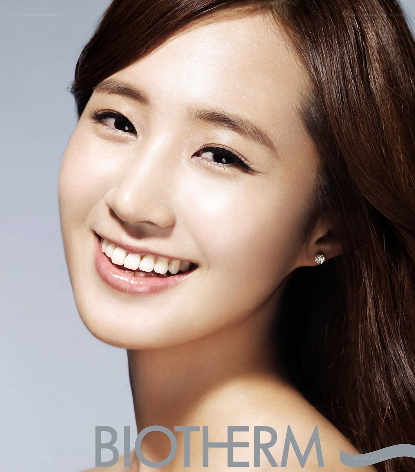 woman smiling in advertisement