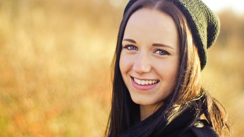 woman smiling in autumn