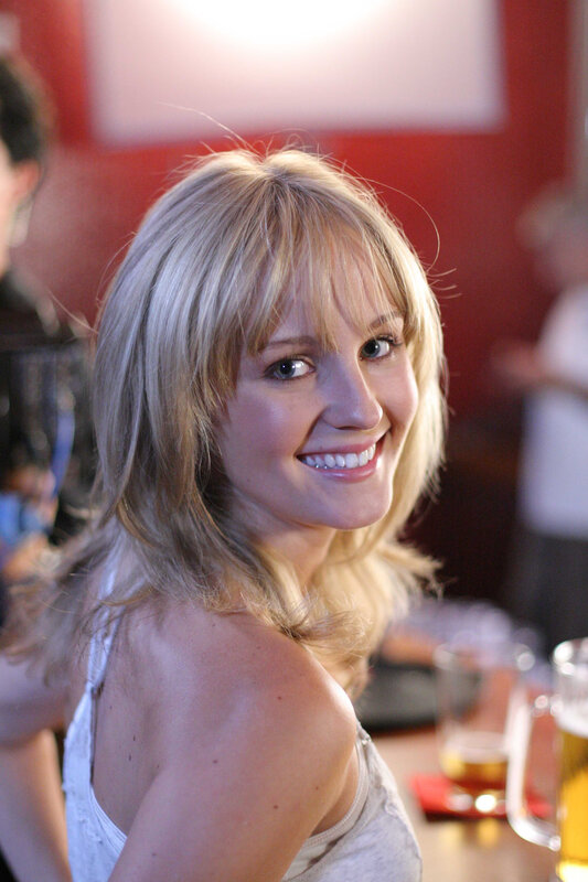 woman smiling in bar