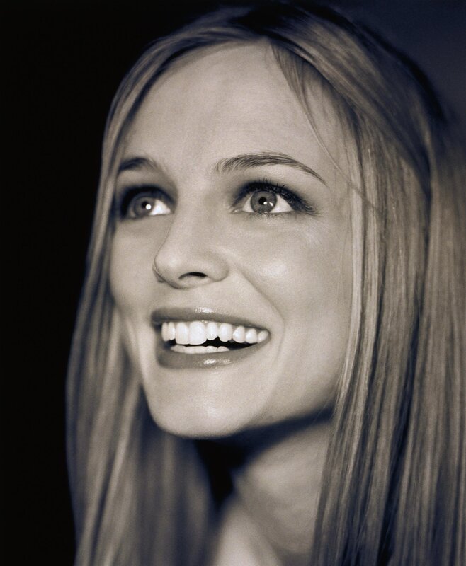 woman smiling in black and white