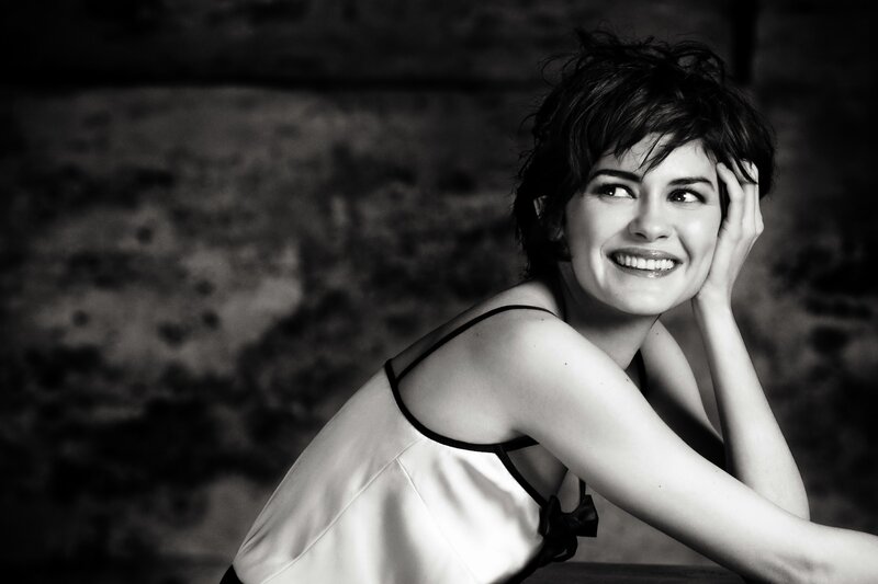 woman smiling in black and white
