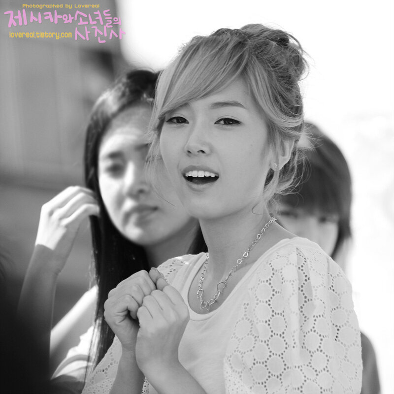 woman smiling in black and white