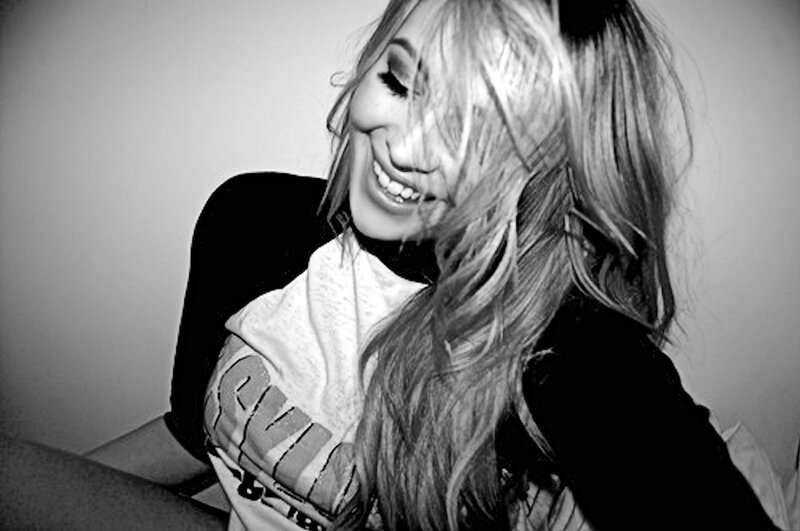 woman smiling in black and white