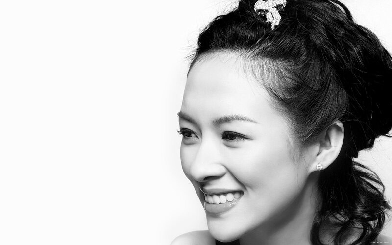woman smiling in black and white