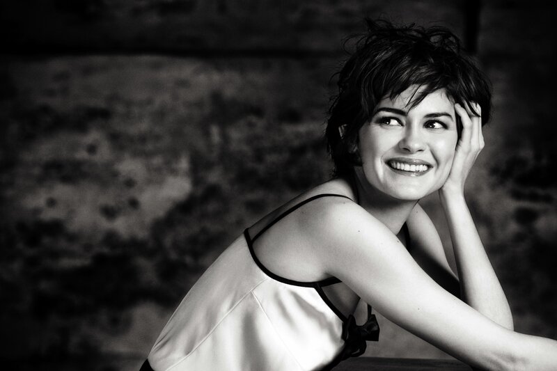 woman smiling in black and white