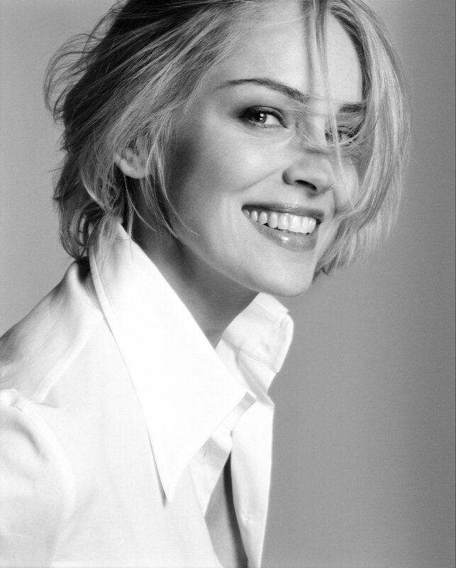 woman smiling in black and white