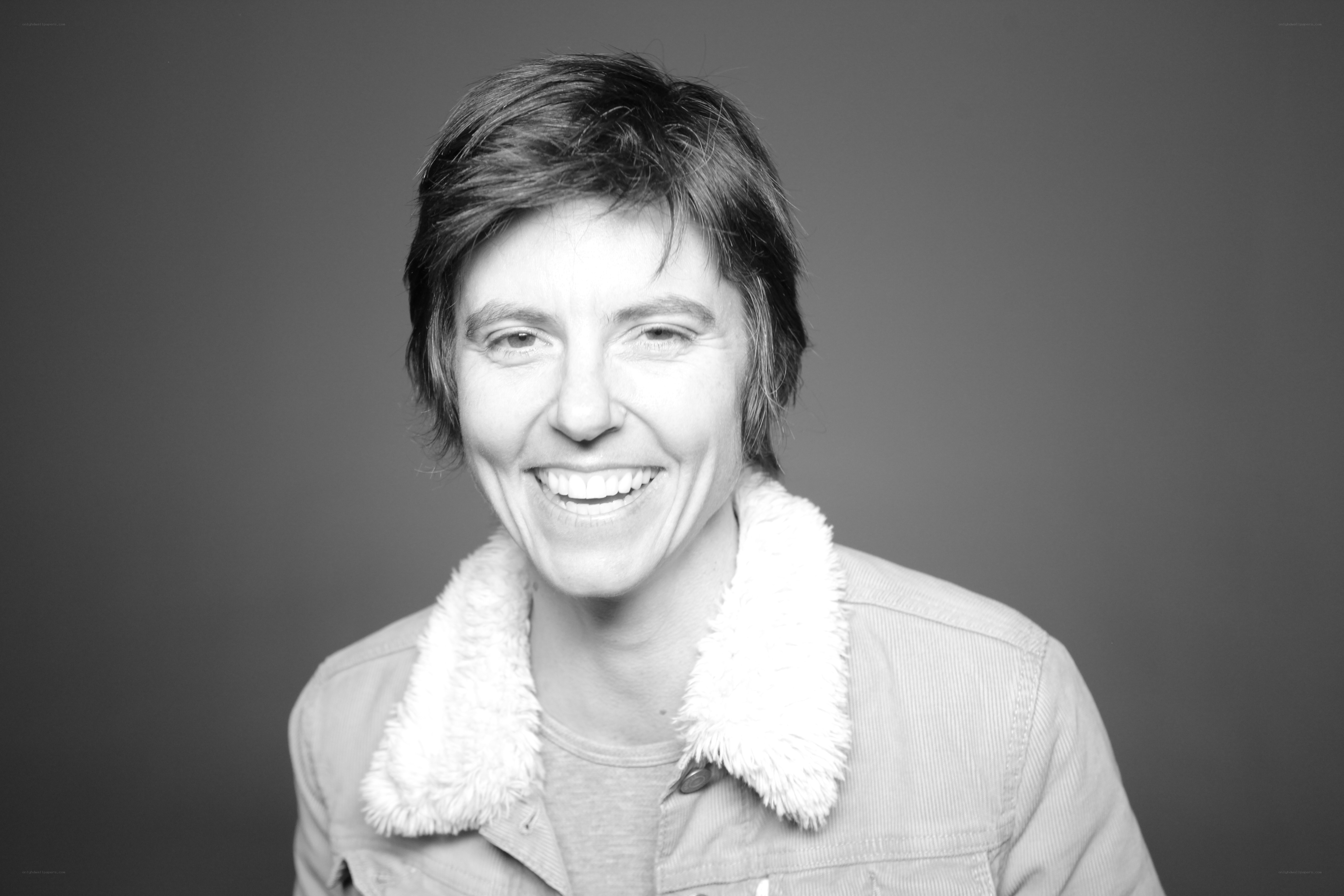 woman smiling in black and white