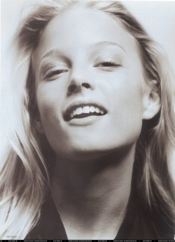 woman smiling in black and white