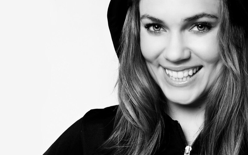 woman smiling in black and white