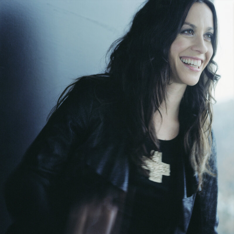 woman smiling in black jacket