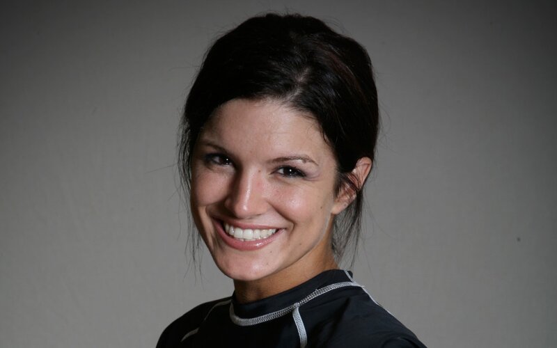 woman smiling in black shirt