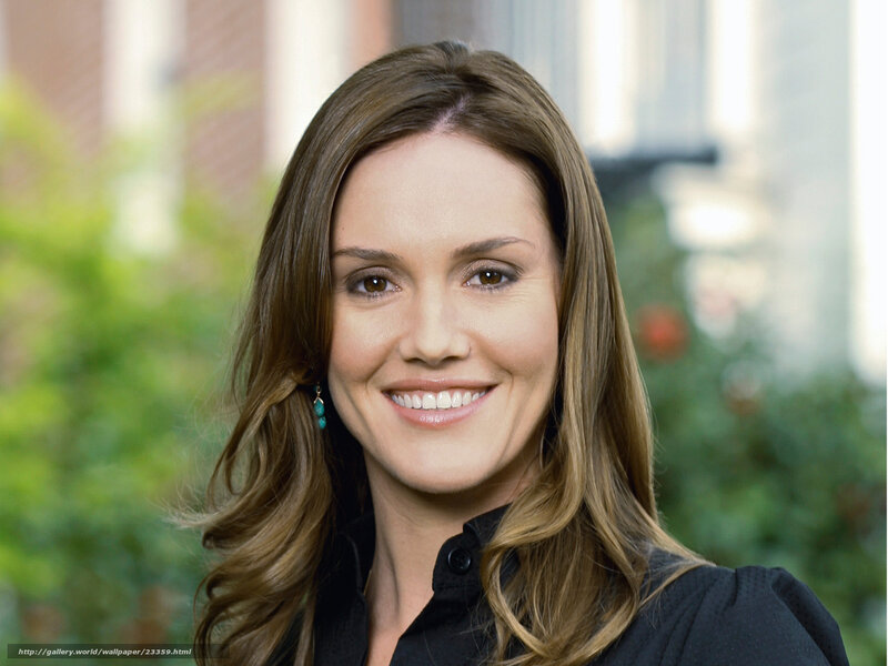 woman smiling in black shirt