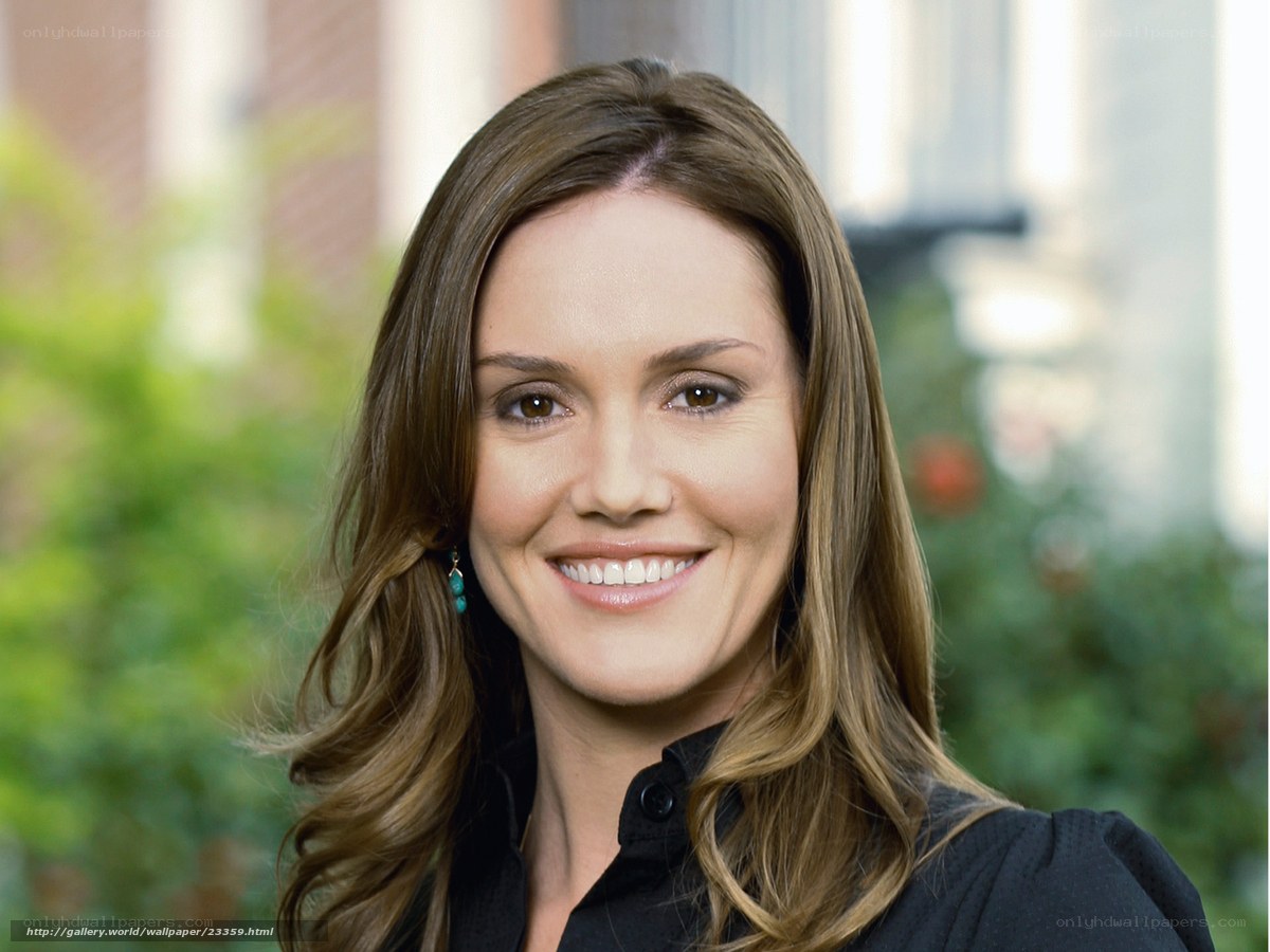 woman smiling in black shirt