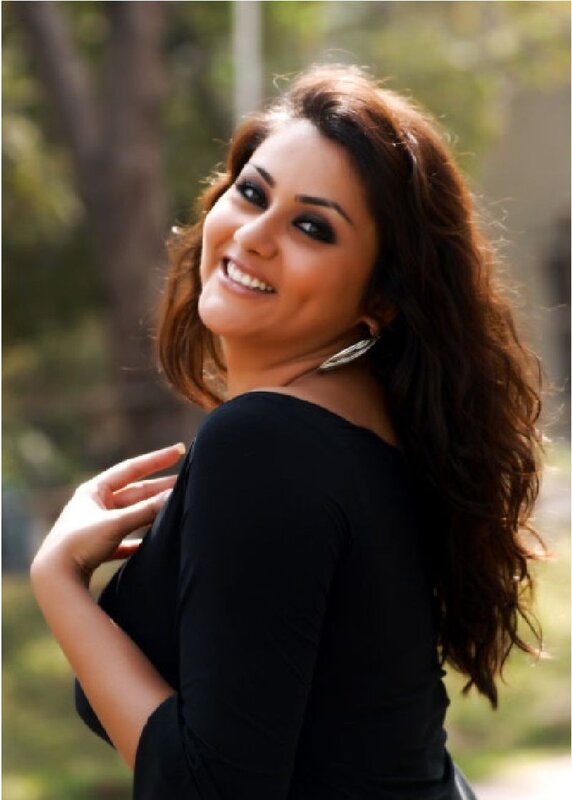 woman smiling in black top