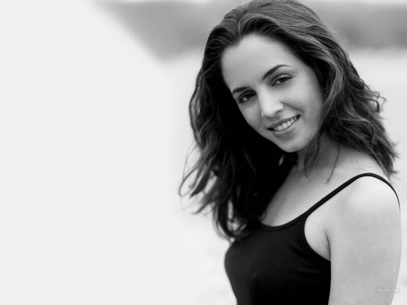 woman smiling in black top