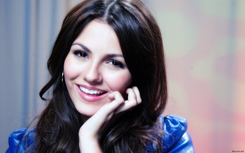 woman smiling in blue top