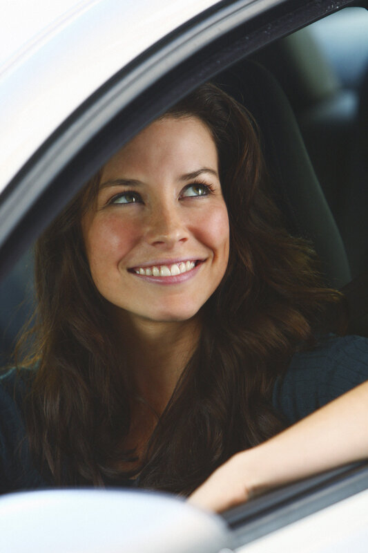 woman smiling in car