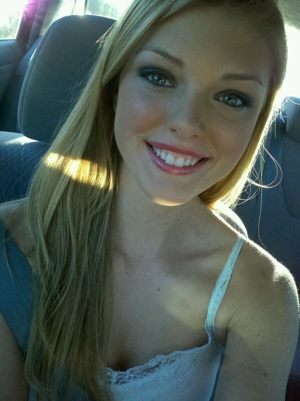 woman smiling in car