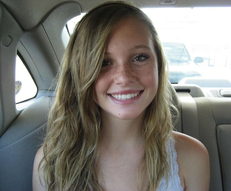 woman smiling in car