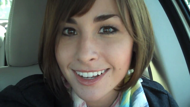 woman smiling in car