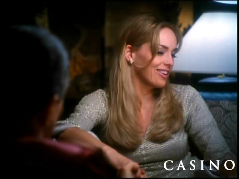 woman smiling in casino scene