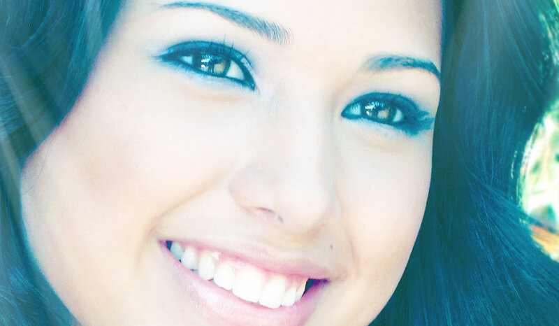 Woman Smiling in Close-up — Blue