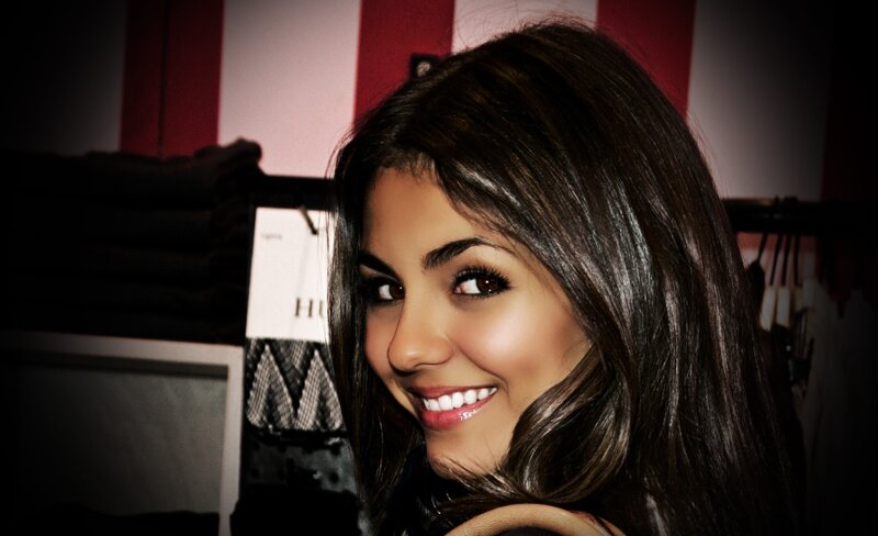 woman smiling in clothing store