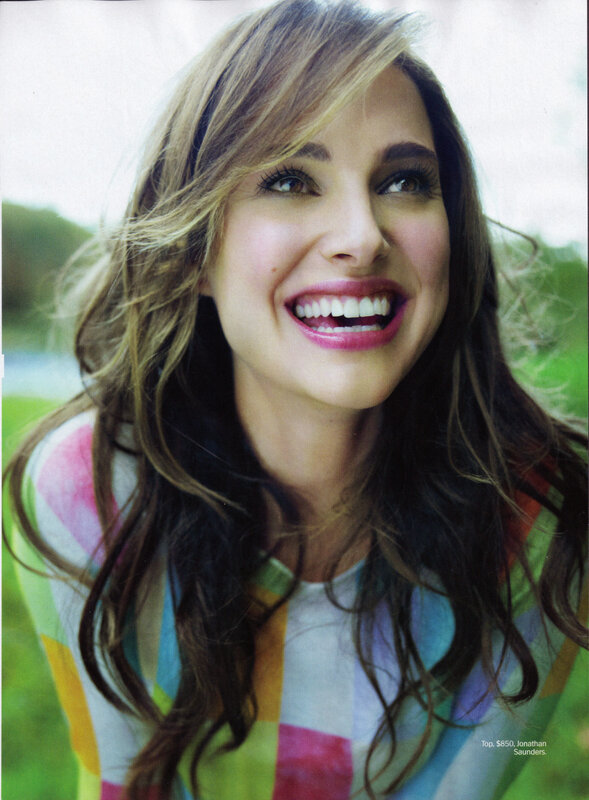 woman smiling in colorful top