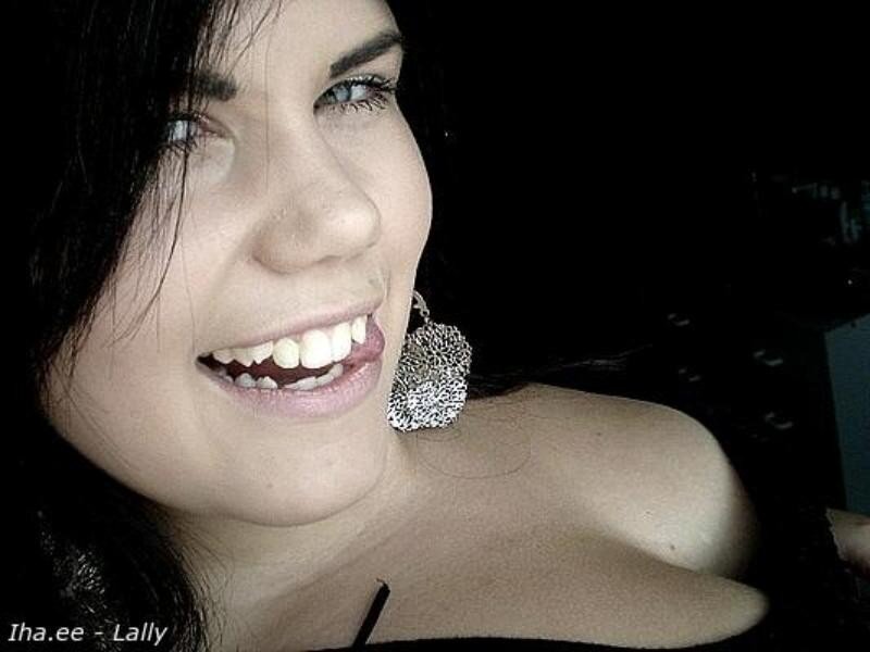 Woman Smiling in Dark — Black, Neutral