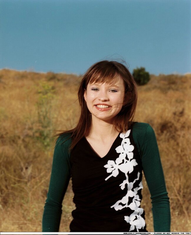 woman smiling in field