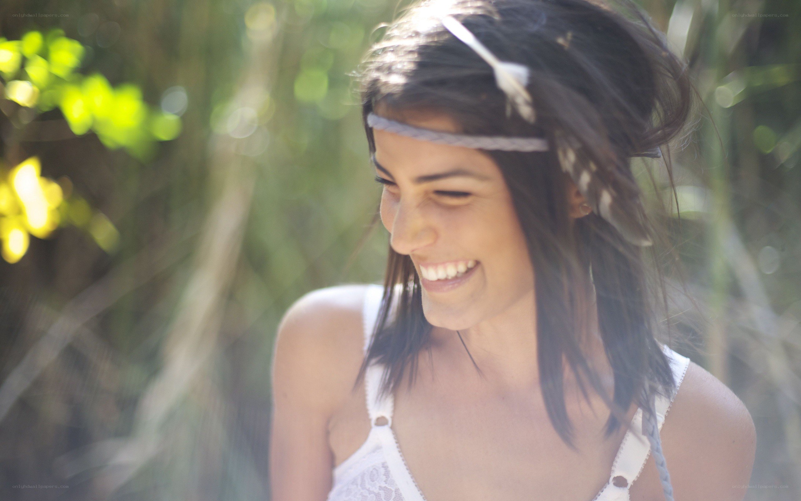 woman smiling in forest