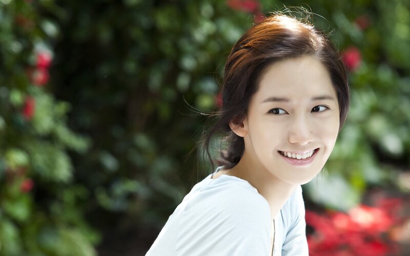 woman smiling in garden
