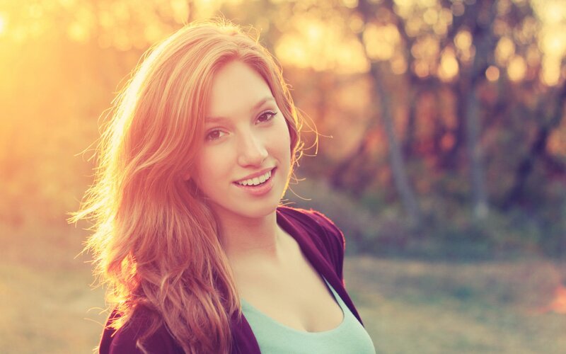 woman smiling in golden light