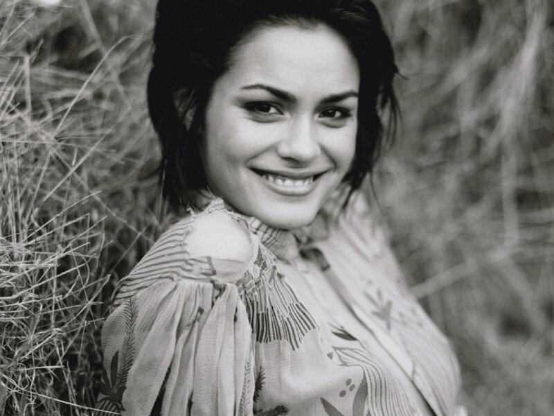 woman smiling in grass