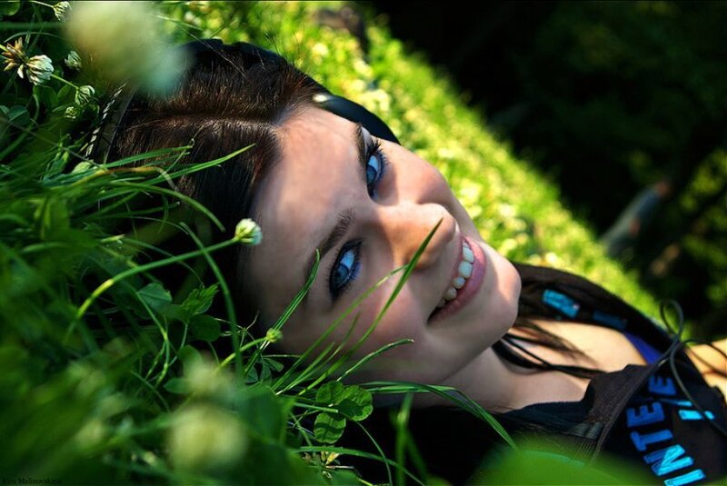 woman smiling in grass