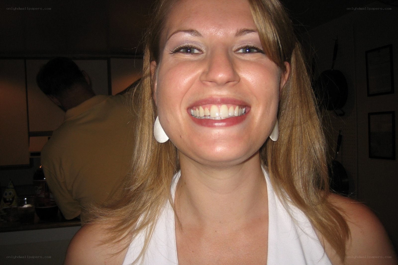 woman smiling in kitchen
