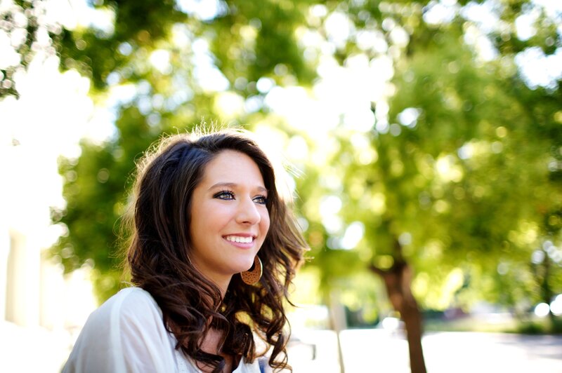 woman smiling in park