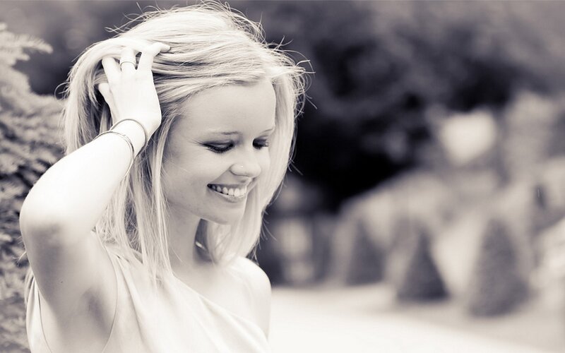 woman smiling in park