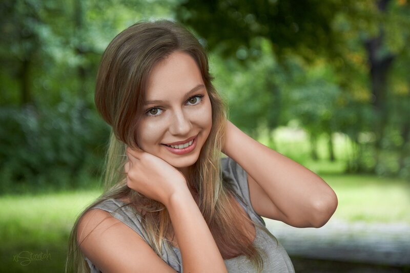 woman smiling in park