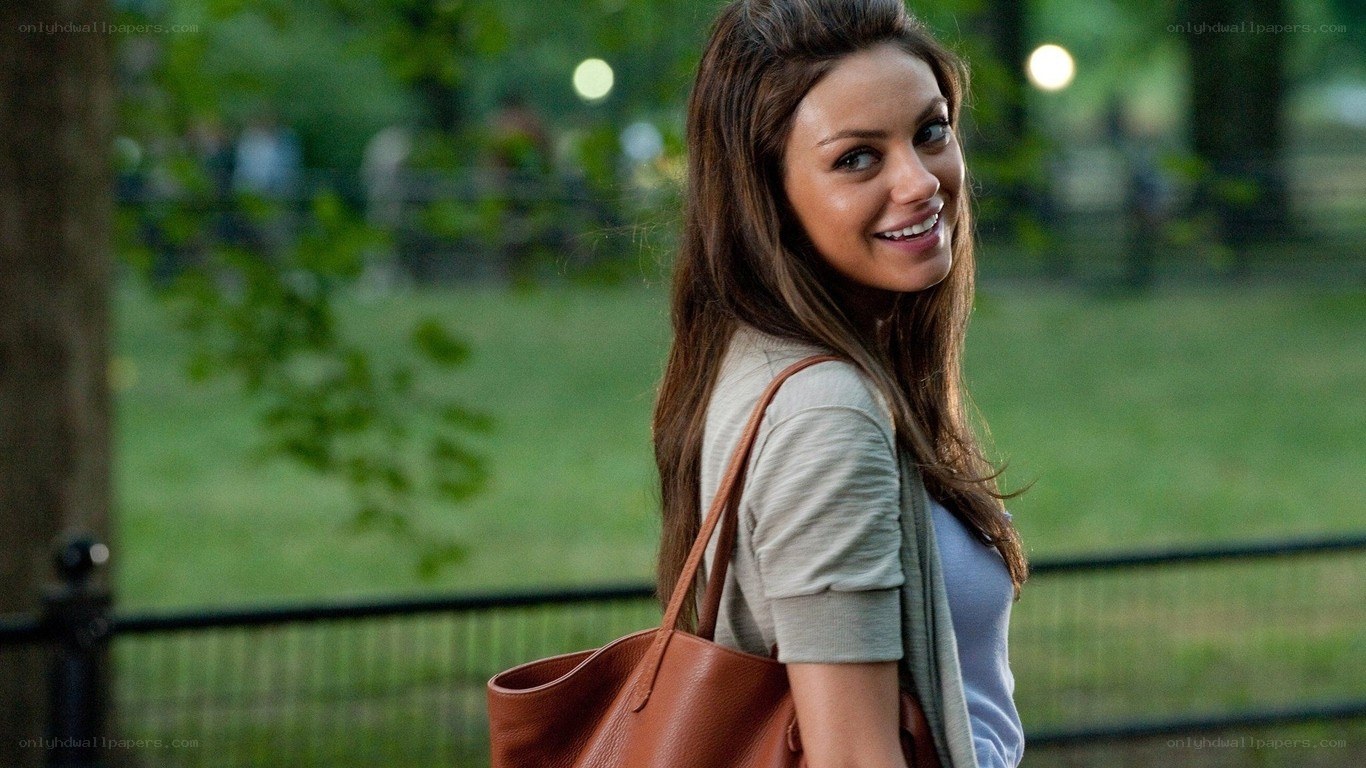 woman smiling in park